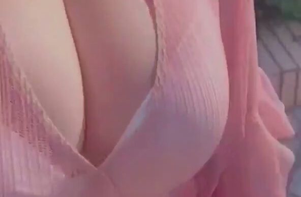 Maomixiner outdoors with big cleavage