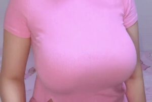 Busty asian Mira pink shirt